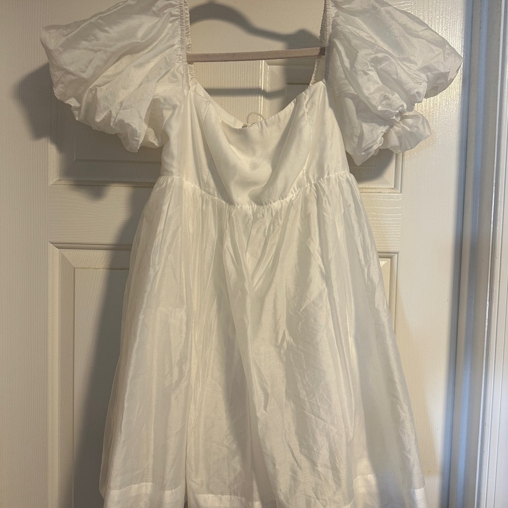 Elegant White Women’s Dress with puff sleeves. Never worn